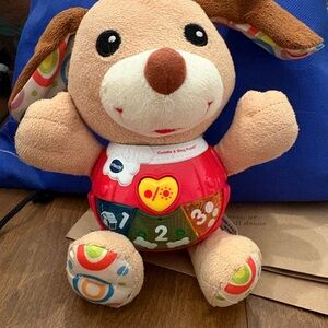 Vtech Cuddle & Sing Puppy - Red and Brown